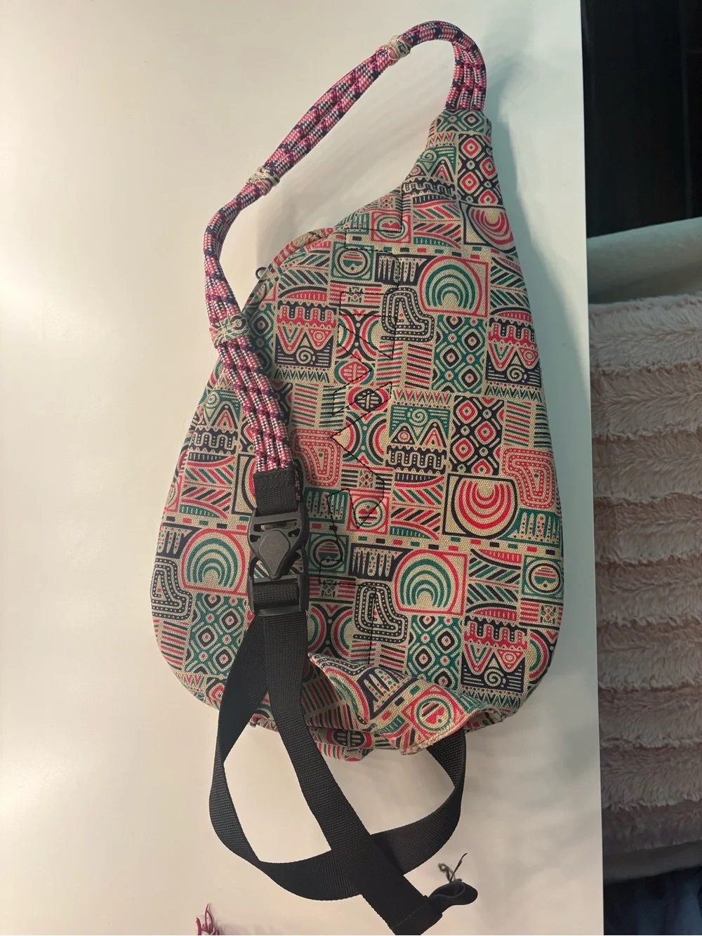 Kavu Geometric Sling Pack in Cream, Green & Red with Purple Accents
